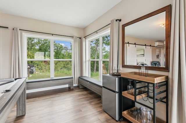 497 S Jakes Landing Way, Ellijay, GA 30540 - bathroom featuring a wall unit AC, wood finished floors, and vanity