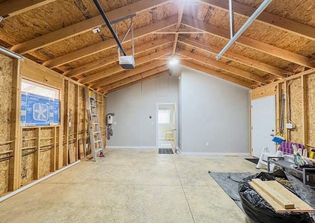 interior space featuring concrete floors and lofted ceiling