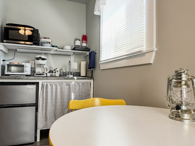 kitchen featuring stainless steel appliances and a toaster