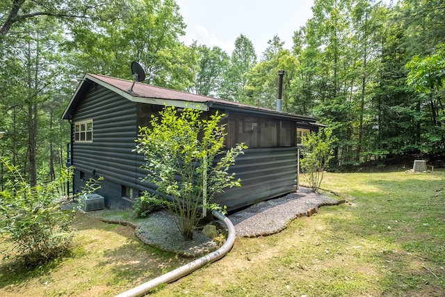 1214 Marrestop Rd, Murphy, NC 28906 - view of side of property with faux log siding, a yard, and central air condition unit