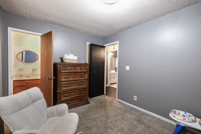 1214 Marrestop Rd, Murphy, NC 28906 - living area featuring carpet floors, a textured ceiling, and baseboards