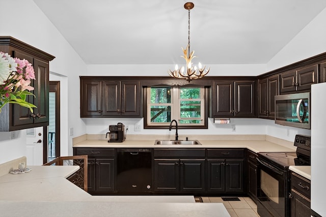 2790 Tamarack Dr, Jasper, GA 30143 - kitchen with black appliances, lofted ceiling, a chandelier, light countertops, and hanging light fixtures