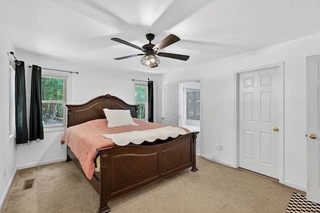 2790 Tamarack Dr, Jasper, GA 30143 - bedroom featuring multiple windows, light carpet, and a ceiling fan