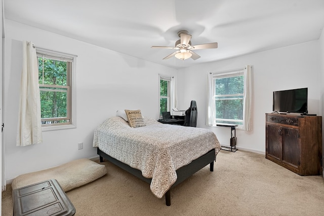 2790 Tamarack Dr, Jasper, GA 30143 - bedroom featuring multiple windows, light carpet, and a ceiling fan