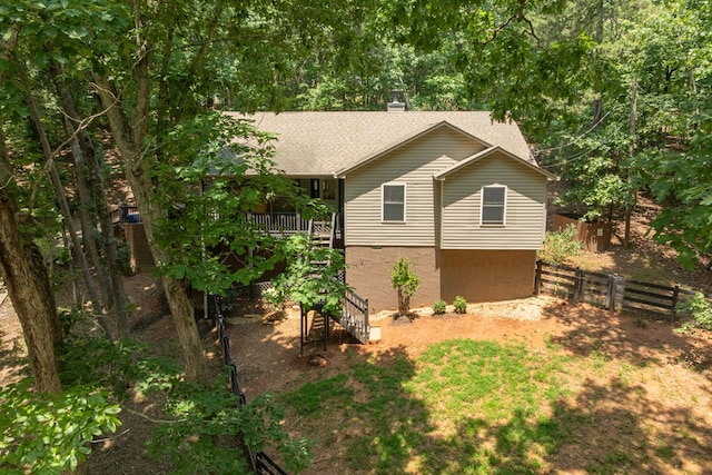 2790 Tamarack Dr, Jasper, GA 30143 - view of home's exterior featuring roof with shingles, stairs, and a chimney