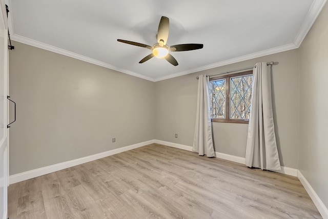 unfurnished room featuring ceiling fan, light hardwood / wood-style flooring, and crown molding