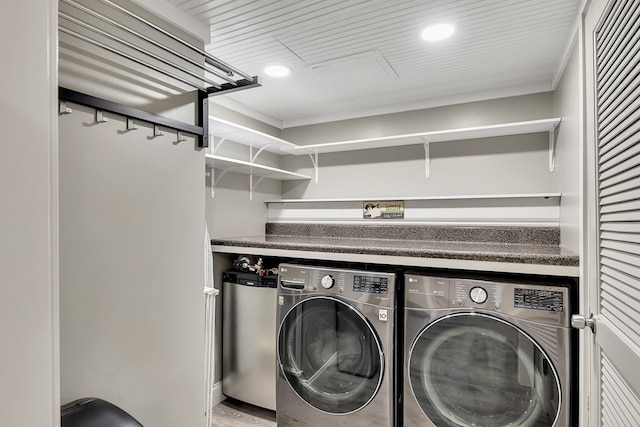 laundry area with independent washer and dryer