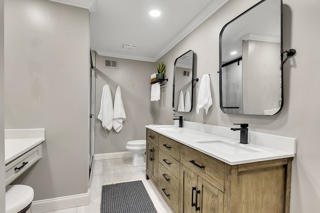 bathroom with toilet, crown molding, and vanity