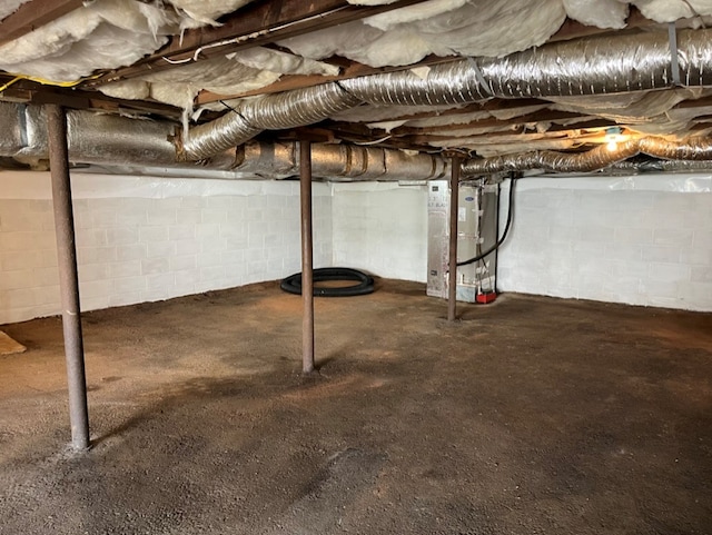 basement featuring heating unit