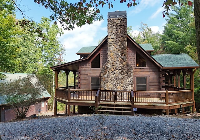 rear view of property with a deck