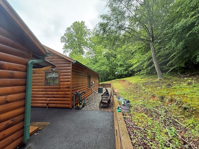 100 Bryant Farm Rd, Murphy, NC 28906 - view of property exterior featuring faux log siding and a patio area