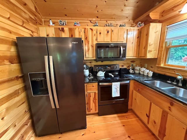 100 Bryant Farm Rd, Murphy, NC 28906 - kitchen featuring black appliances, wood ceiling, light wood-style flooring, and wooden walls