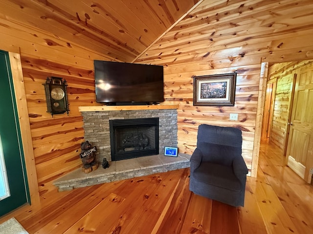 100 Bryant Farm Rd, Murphy, NC 28906 - living area featuring wooden ceiling, wood walls, a fireplace, vaulted ceiling, and wood-type flooring