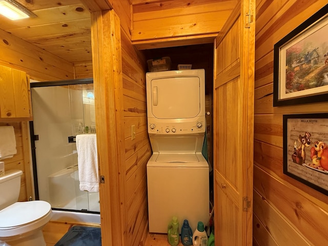 100 Bryant Farm Rd, Murphy, NC 28906 - laundry area with estacked washer and dryer and wood walls