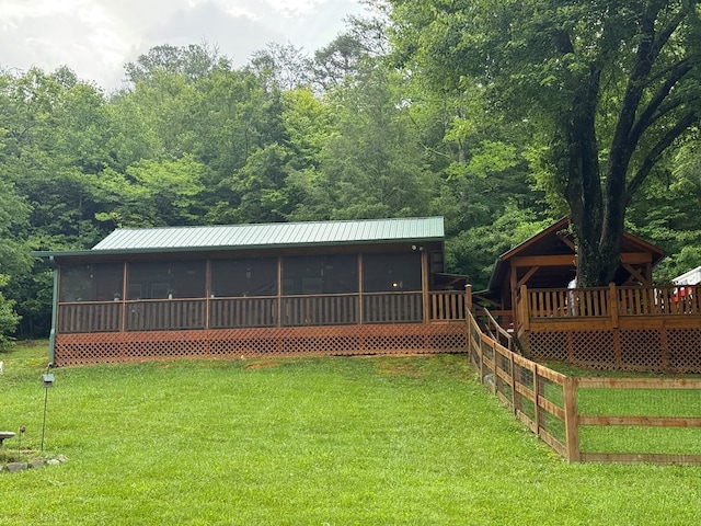 100 Bryant Farm Rd, Murphy, NC 28906 - back of property featuring a sunroom, a yard, and a deck