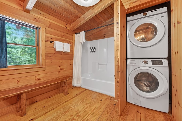 305 Kimbolton Dr, Morganton, GA 30560 - laundry room featuring stacked washing machine and dryer, light wood finished floors, wooden walls, and wood ceiling