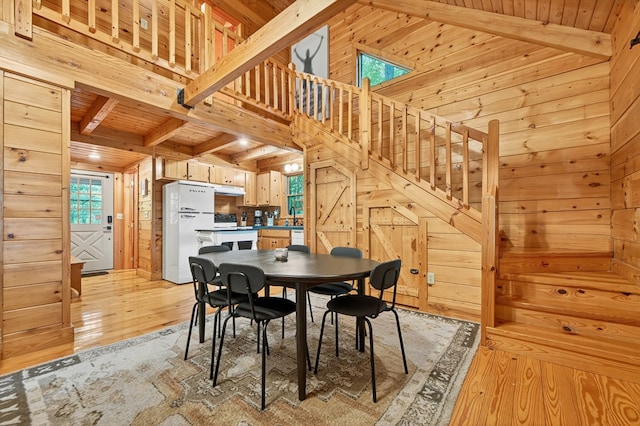 305 Kimbolton Dr, Morganton, GA 30560 - dining area with wood walls, a wooden ceiling with exposed beams, light wood-style flooring, and stairway