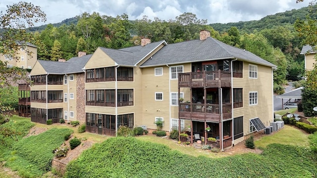 view of property featuring central air condition unit