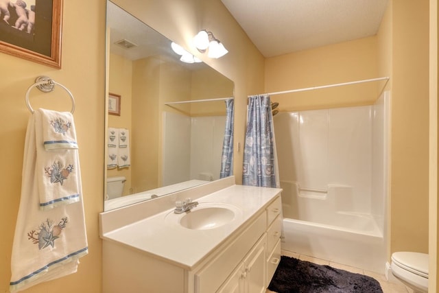 full bathroom featuring vanity, toilet, shower / bath combo, a textured ceiling, and tile patterned flooring