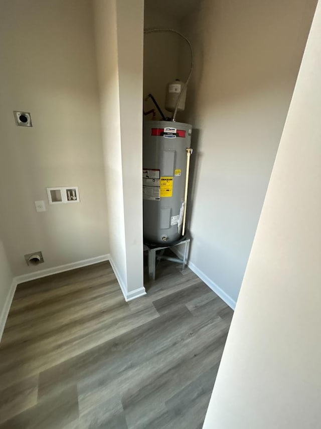 utility room with electric water heater