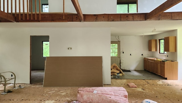 interior space with beamed ceiling