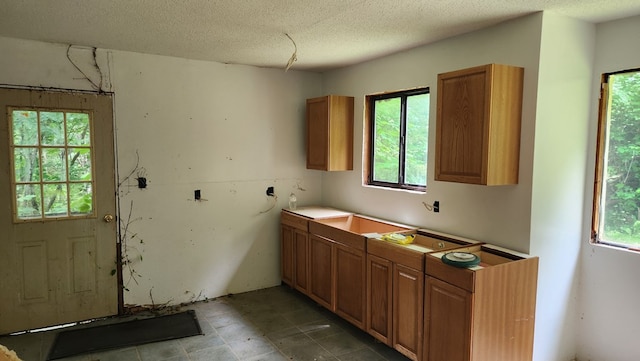 kitchen featuring a textured ceiling