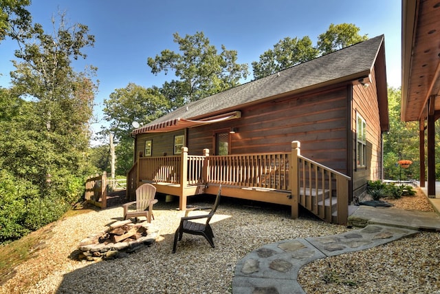 36 Rustic Barn Trl, Morganton, GA 30560 - exterior space with a deck, roof with shingles, and a fire pit