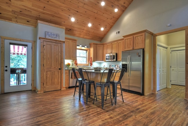 36 Rustic Barn Trl, Morganton, GA 30560 - kitchen featuring appliances with stainless steel finishes, dark wood-style floors, a center island, a kitchen breakfast bar, and recessed lighting