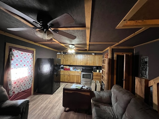 living room featuring ceiling fan and light hardwood / wood-style floors