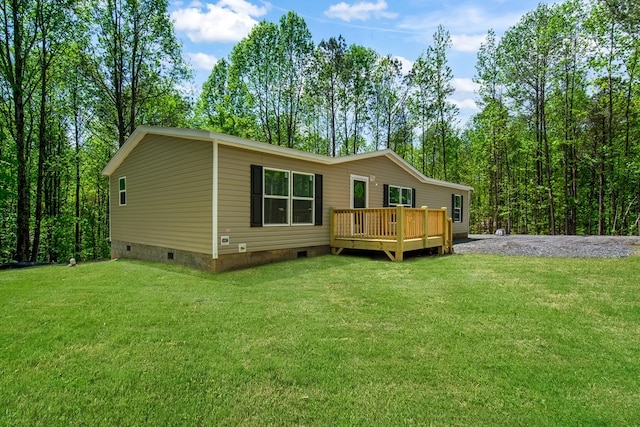 251 Ebenezer Rd, Ellijay, GA 30536 - back of house featuring a yard, a deck, and crawl space