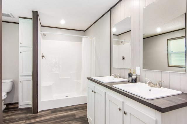 251 Ebenezer Rd, Ellijay, GA 30536 - full bath with a sink, toilet, a shower stall, and wood finished floors