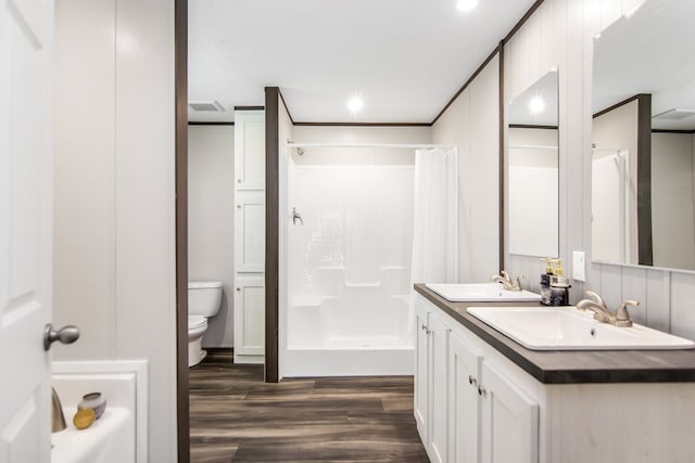 251 Ebenezer Rd, Ellijay, GA 30536 - bathroom featuring toilet, a shower with shower curtain, wood finished floors, and a sink