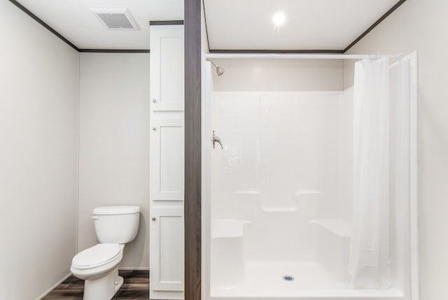 251 Ebenezer Rd, Ellijay, GA 30536 - full bath featuring toilet, visible vents, wood finished floors, and a shower stall