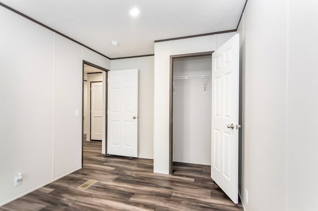 251 Ebenezer Rd, Ellijay, GA 30536 - unfurnished bedroom with a closet and dark wood-style floors