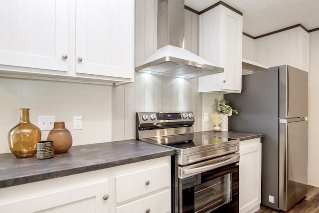251 Ebenezer Rd, Ellijay, GA 30536 - kitchen with wall chimney range hood, appliances with stainless steel finishes, white cabinetry, and dark countertops