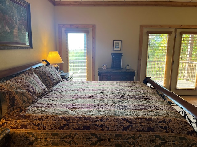 bedroom featuring multiple windows