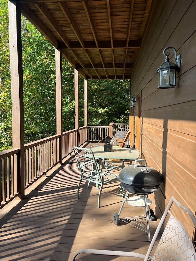 wooden deck with area for grilling