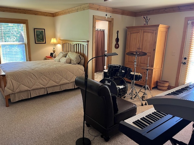 bedroom featuring light colored carpet