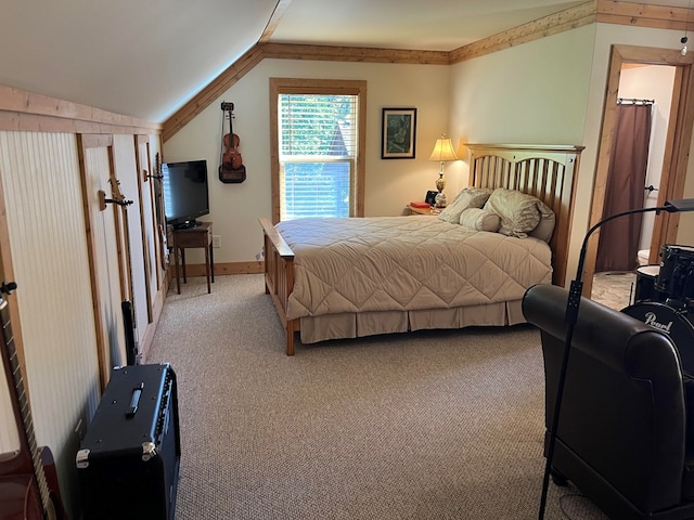 carpeted bedroom with vaulted ceiling