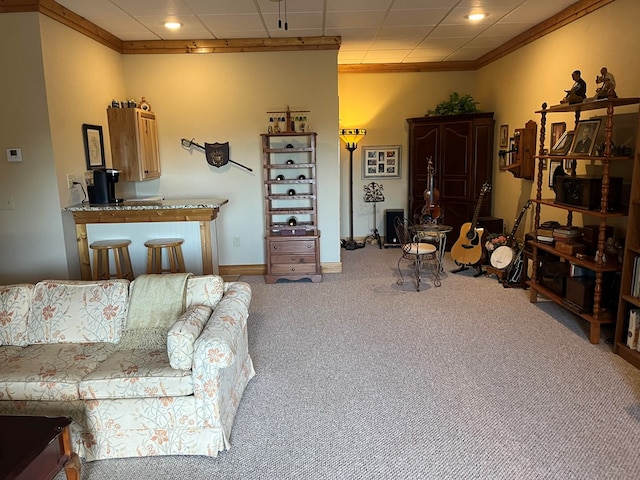 living room with carpet flooring and ornamental molding