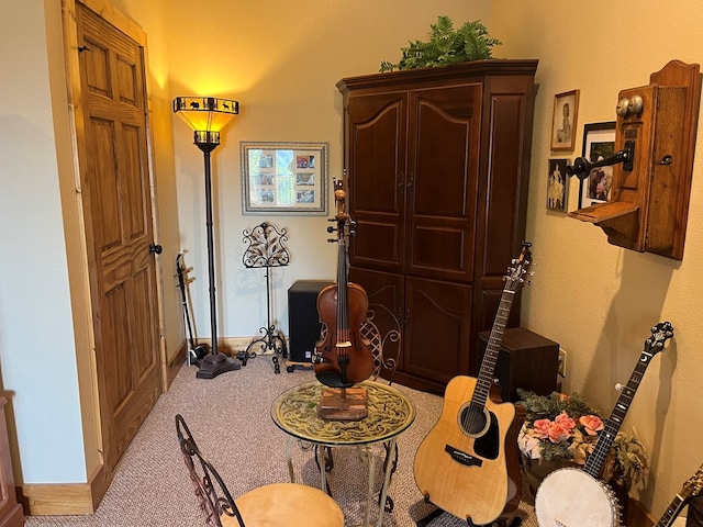 dining space featuring light colored carpet