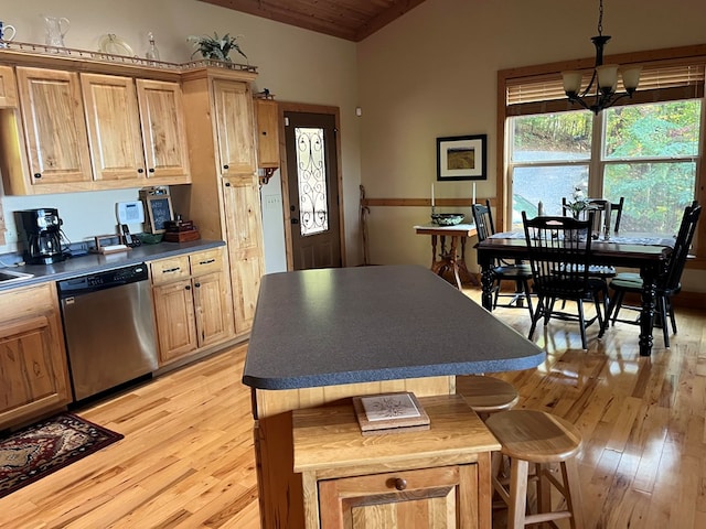 kitchen with wood ceiling, a breakfast bar, an inviting chandelier, stainless steel dishwasher, and light hardwood / wood-style floors