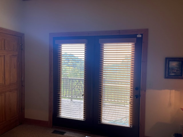 doorway to outside featuring french doors