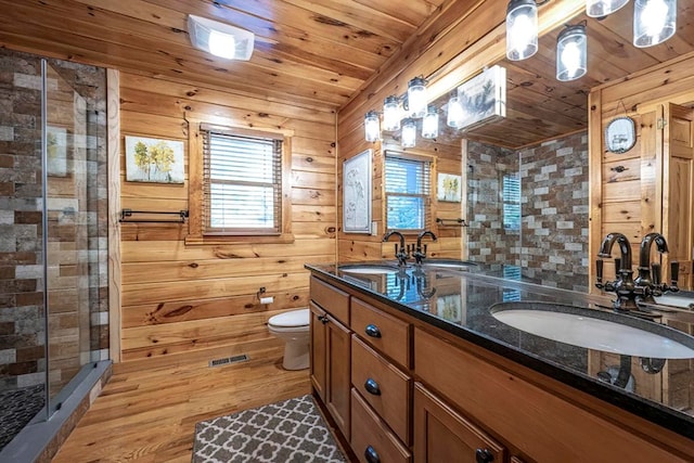 full bath with wooden ceiling, visible vents, a sink, and toilet