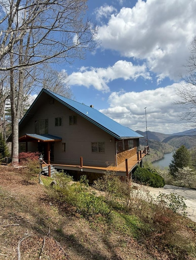 369 Deals Gap Rd, Robbinsville, NC 28771 - view of property exterior with a deck with water view and metal roof