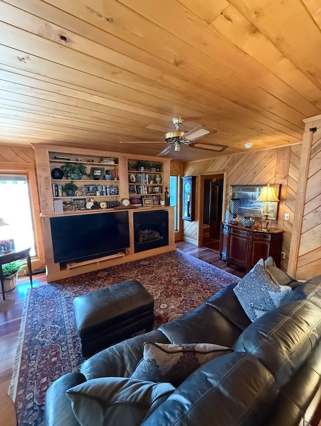369 Deals Gap Rd, Robbinsville, NC 28771 - living area featuring wood walls, a ceiling fan, wooden ceiling, and wood finished floors