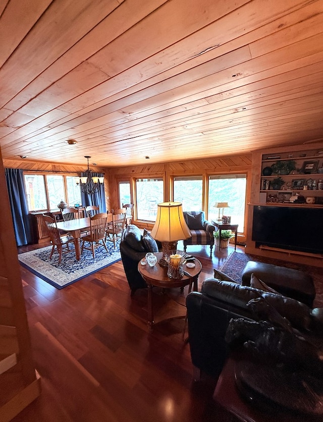 369 Deals Gap Rd, Robbinsville, NC 28771 - living area featuring a chandelier, wood ceiling, wood finished floors, and a healthy amount of sunlight