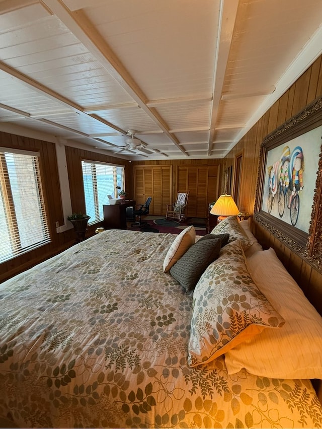 369 Deals Gap Rd, Robbinsville, NC 28771 - bedroom with wood walls and beam ceiling