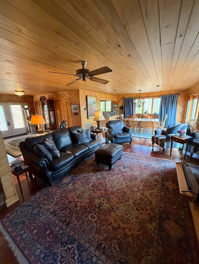 369 Deals Gap Rd, Robbinsville, NC 28771 - living area with wooden walls, ceiling fan, wood finished floors, and wood ceiling