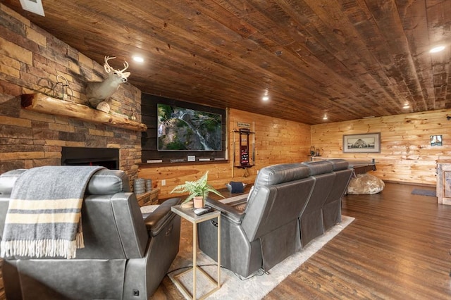 9 Quail Holw, Blue Ridge, GA 30513 - home theater room with wood ceiling, wood finished floors, a fireplace, and wooden walls